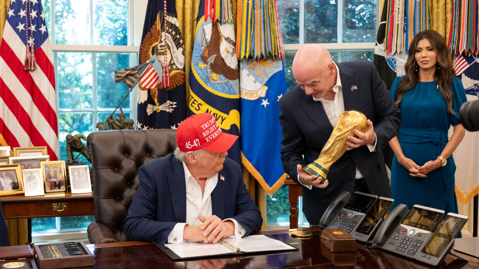 Gianni Infantino presents Trump with World Cup trophy